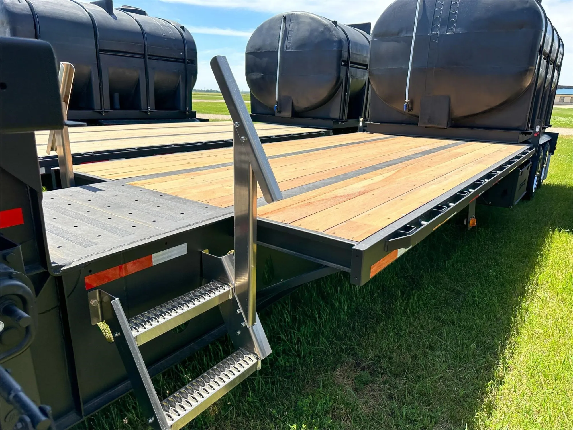 Demco Liquid Tender Trailer | Trailer Length 48' | Dual 3250 Gallon Tanks | Front/Rear Aux Power & Air Couplers | For Tractors