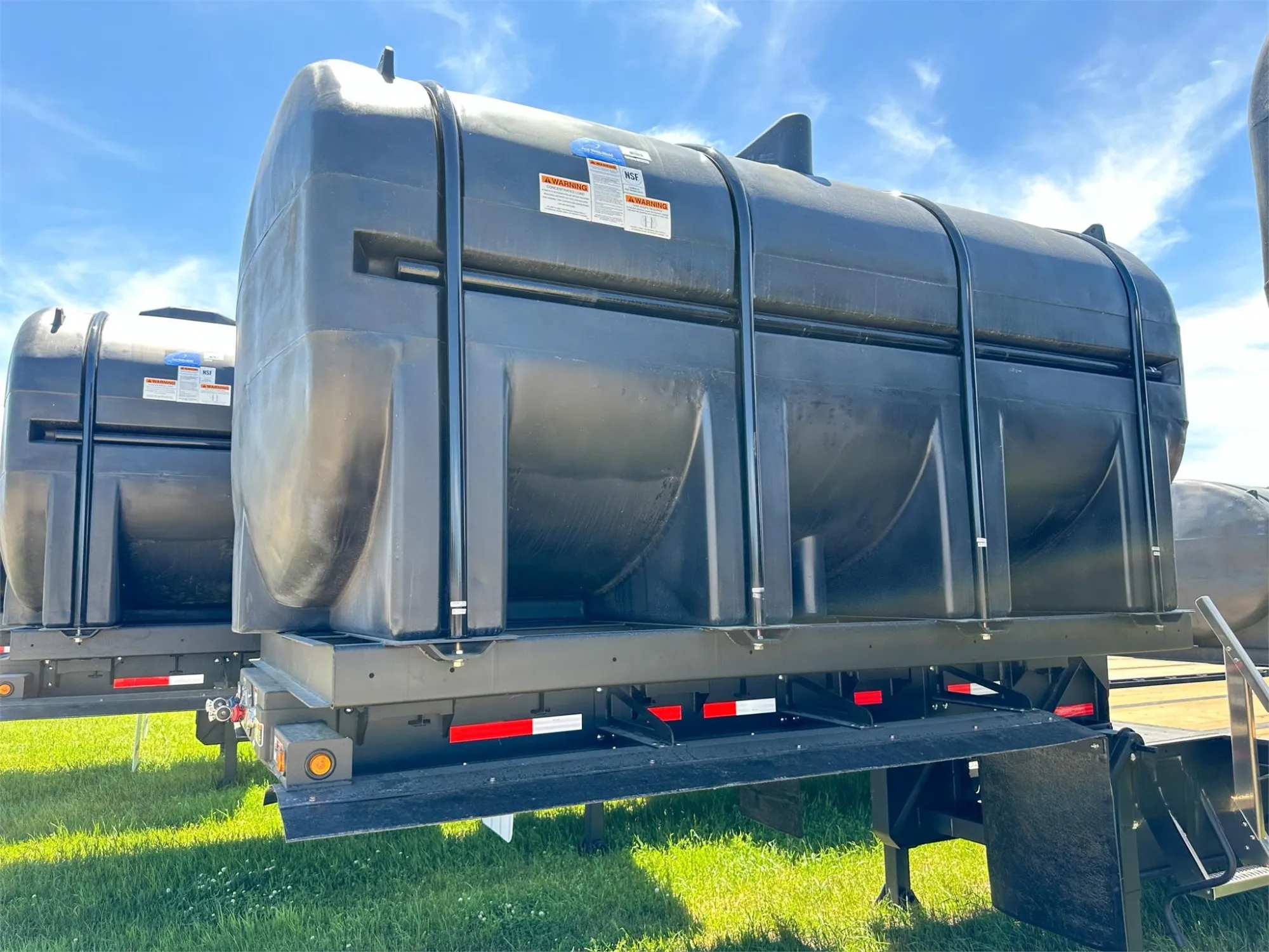 Demco Liquid Tender Trailer | Trailer Length 48' | Dual 3250 Gallon Tanks | Front/Rear Aux Power & Air Couplers | For Tractors